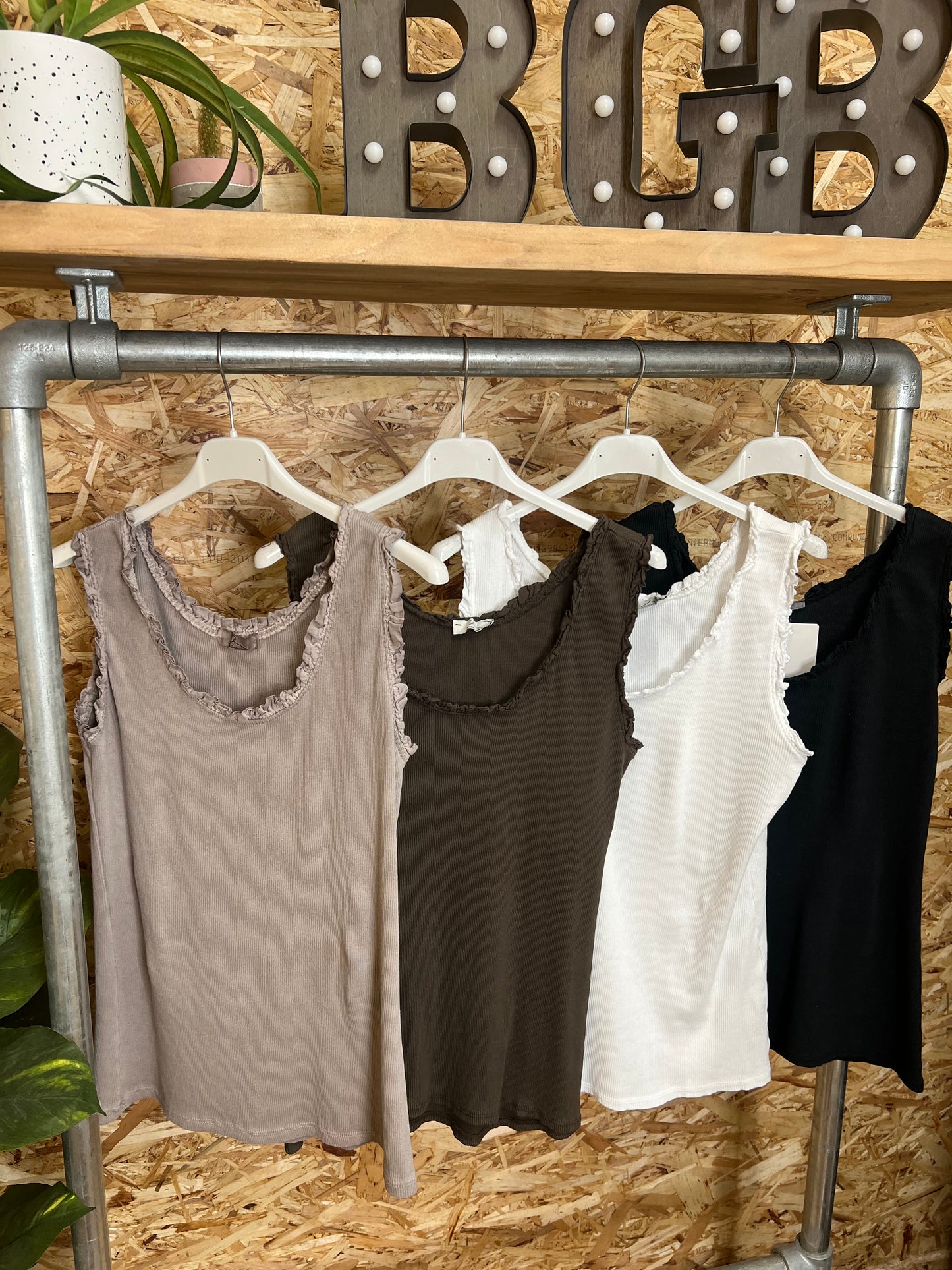Ruffle Edge Vests