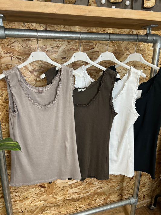 Ruffle Edge Vests